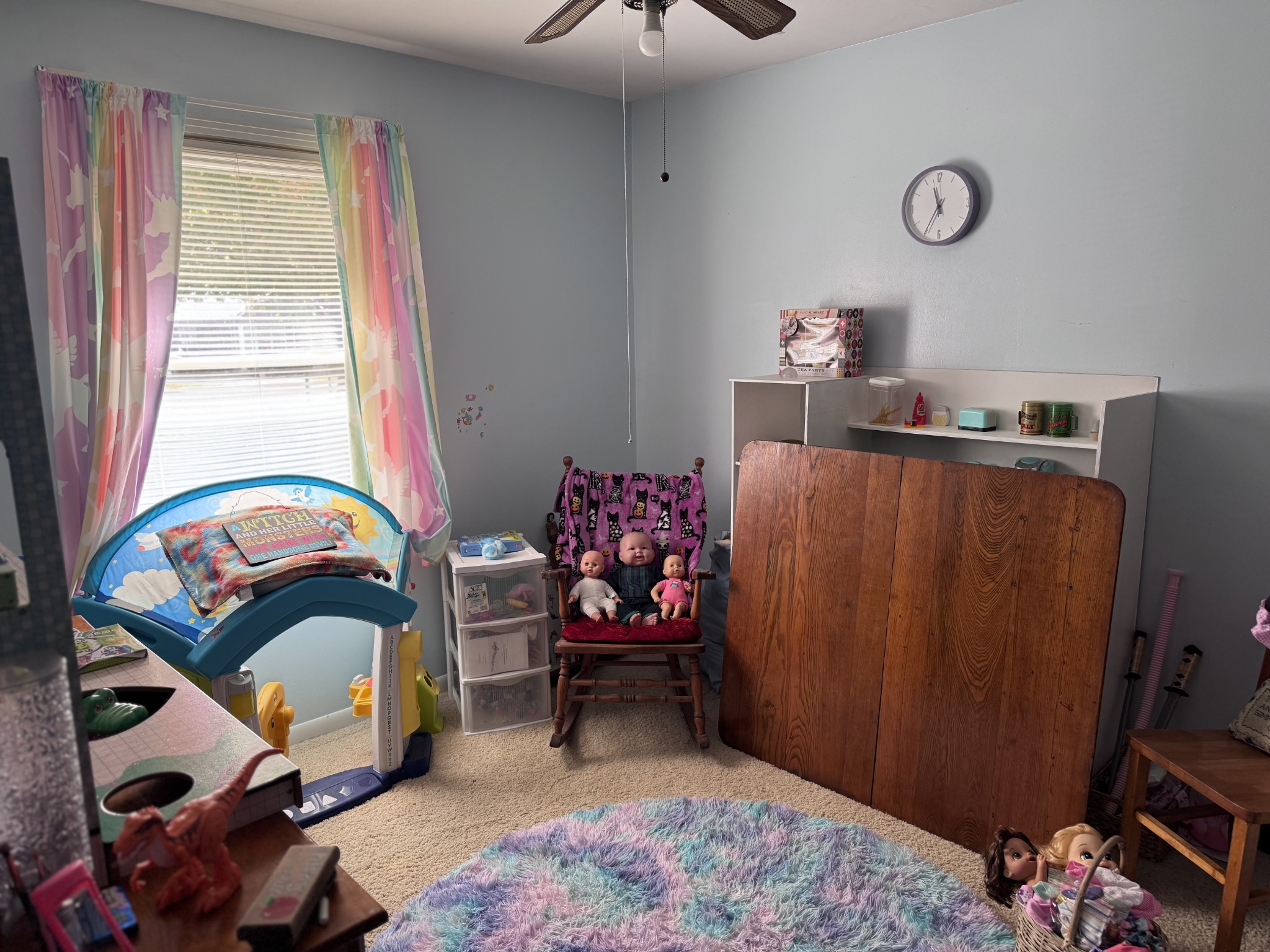 205 Draper Avenue Greenbrier, TN 37073 - Photo 17 of 27 a bedroom with a bed and a chandelier