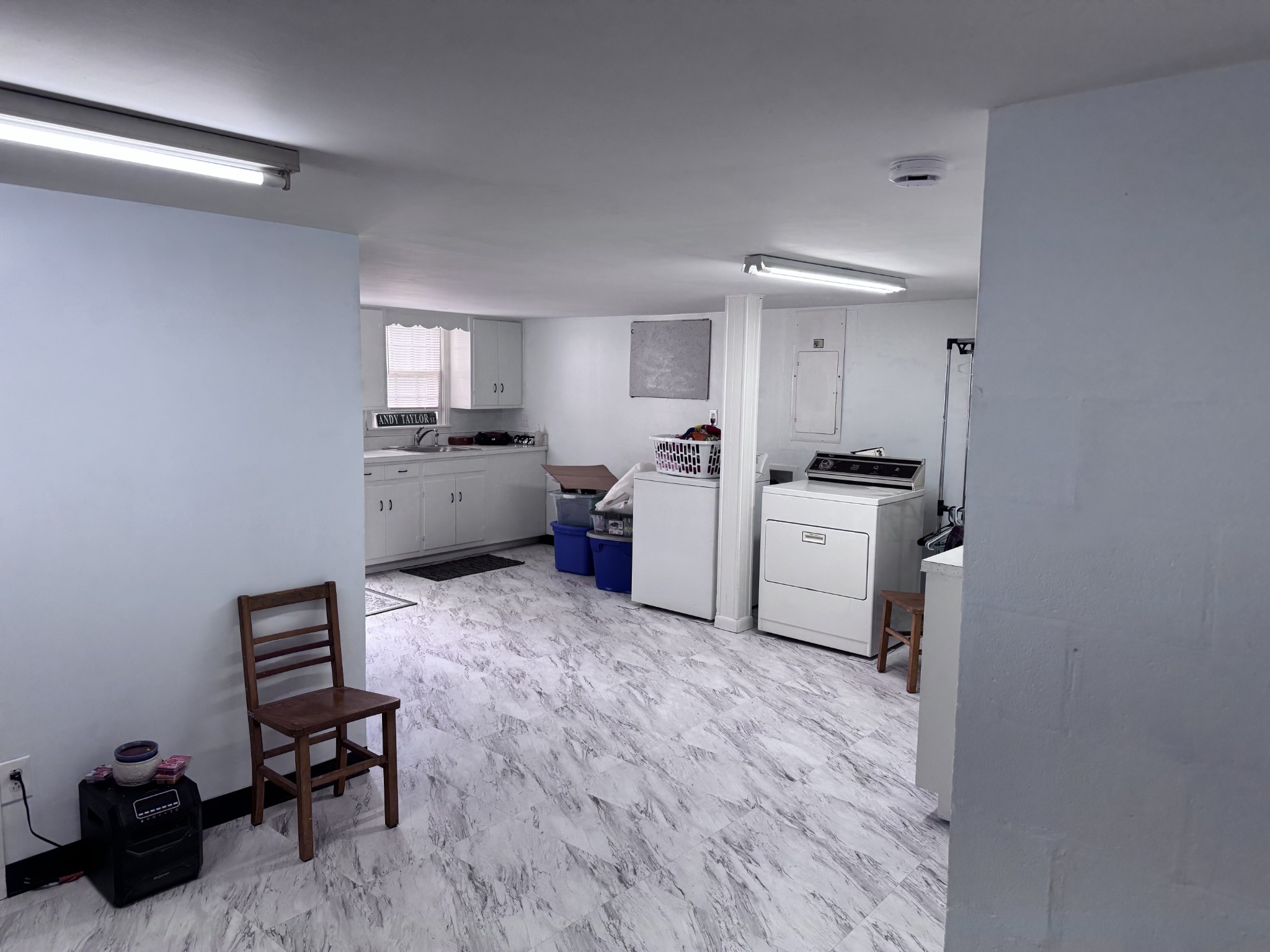 205 Draper Avenue Greenbrier, TN 37073 - Photo 23 of 27 a utility room with cabinets dryer and washer