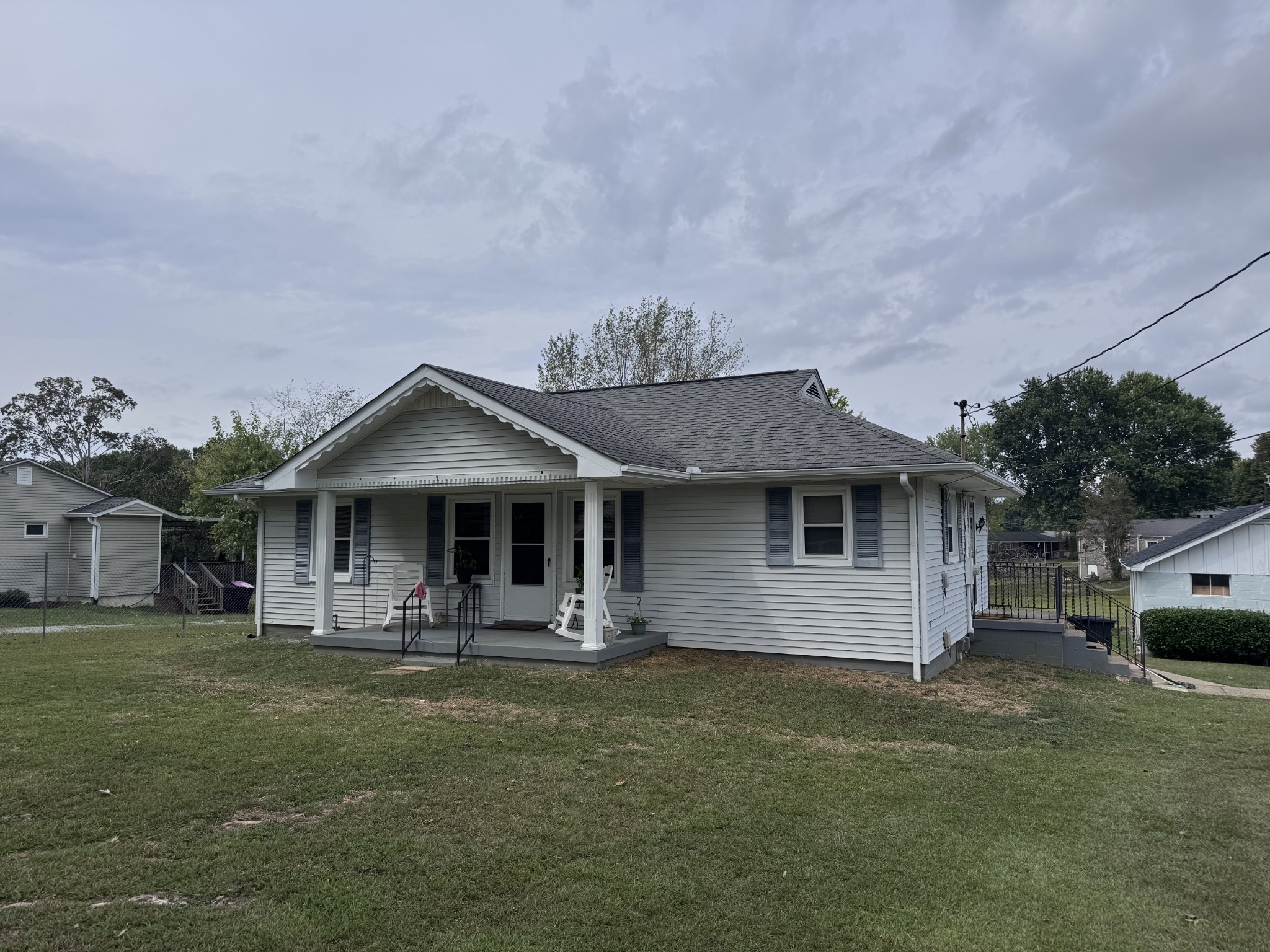 205 Draper Avenue Greenbrier, TN 37073 - Photo 3 of 27 a front view of house with yard and seating
