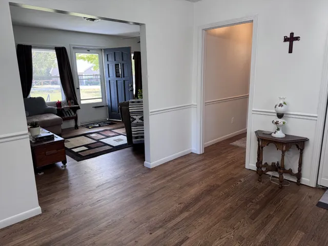 a view of a livingroom with furniture and a couch