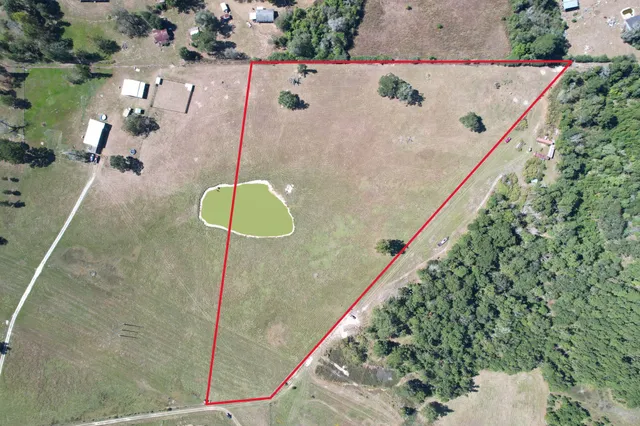 a view of a balcony with chairs