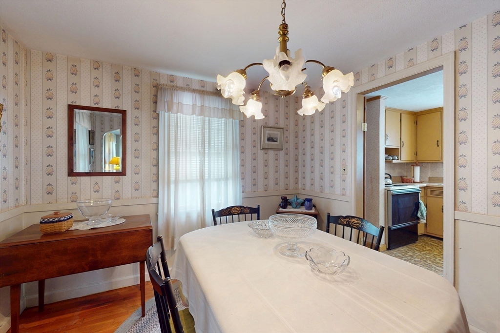 157 Gillette Avenue Springfield, MA 01118 - Photo 8 of 41 a view of a dining room with furniture and wooden floor