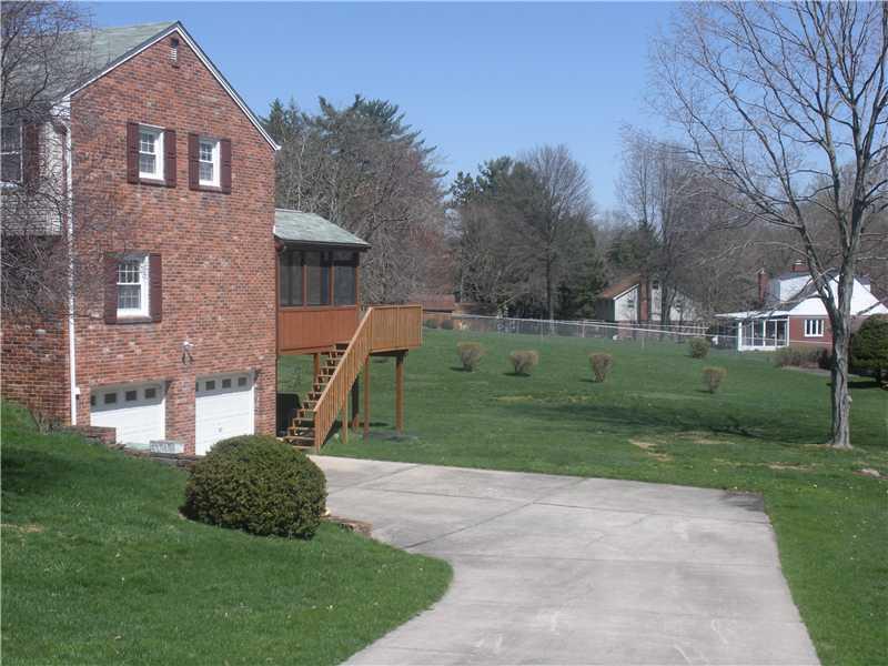 218 Ridgeview Drive Venetia, PA 15367 - Photo 12 of 16 Land/Lot. Spacious double garage with expansive concrete driveway to accommodate plenty of additional parking.