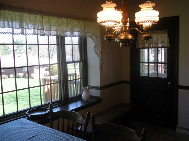 218 Ridgeview Drive Venetia, PA 15367 - Photo 6 of 16 Kitchen. Large picture window. Step out to the relaxing screened porch. Beautiful!