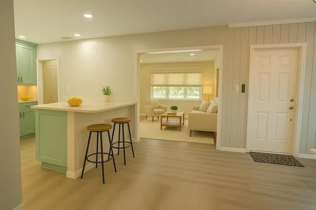 a living room with furniture and a table