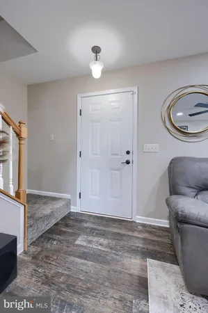 a view of livingroom with furniture and wooden floor