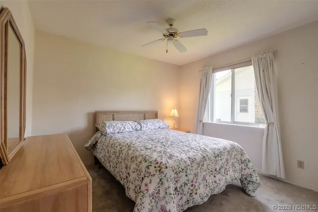 a bathroom with a sink toilet a mirror and shower
