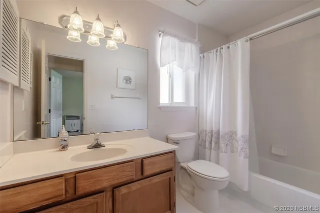 a view of a livingroom with a hallway