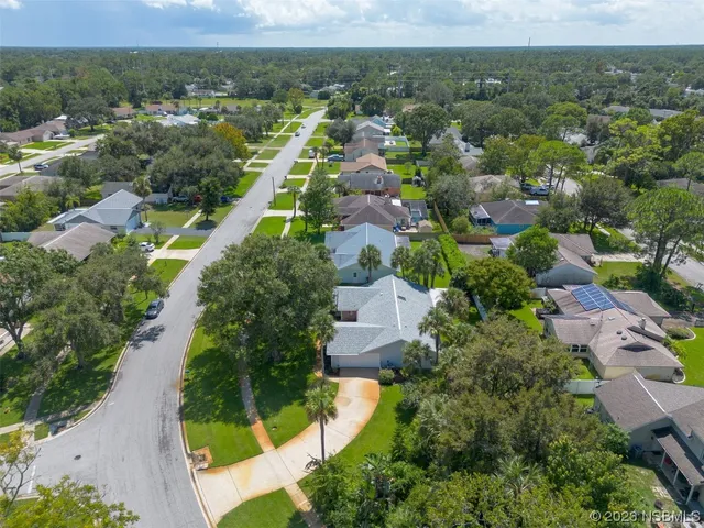 an aerial view of multiple house
