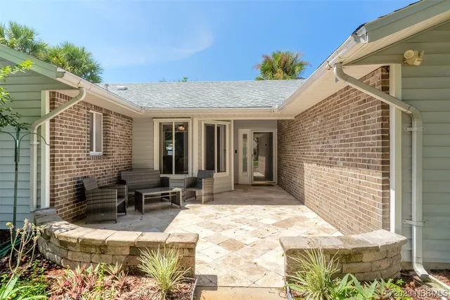 a view of a dinning room with patio