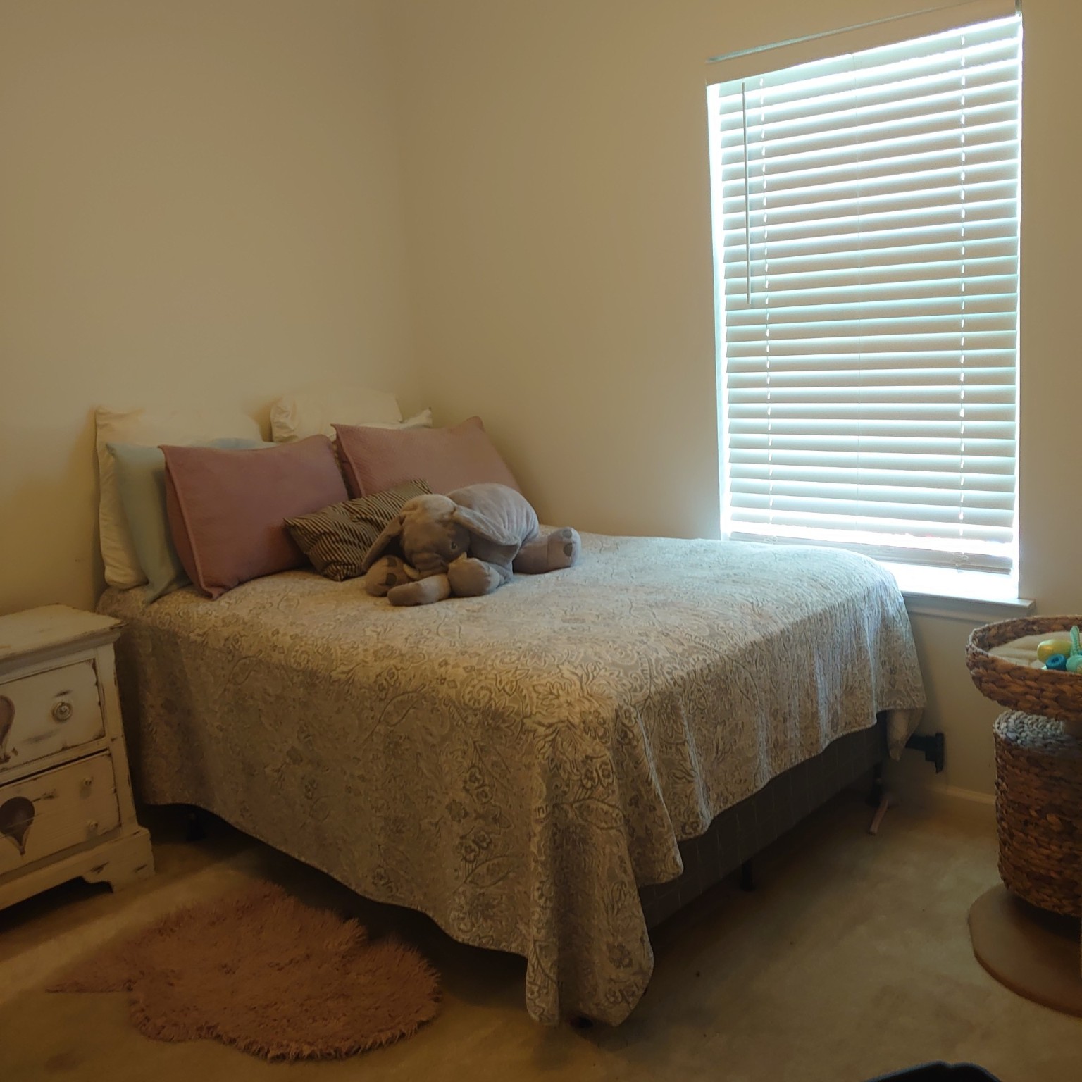 27946 Hickory Drive Splendora, TX 77372 - Photo 16 of 18 a bedroom with a bed and a window