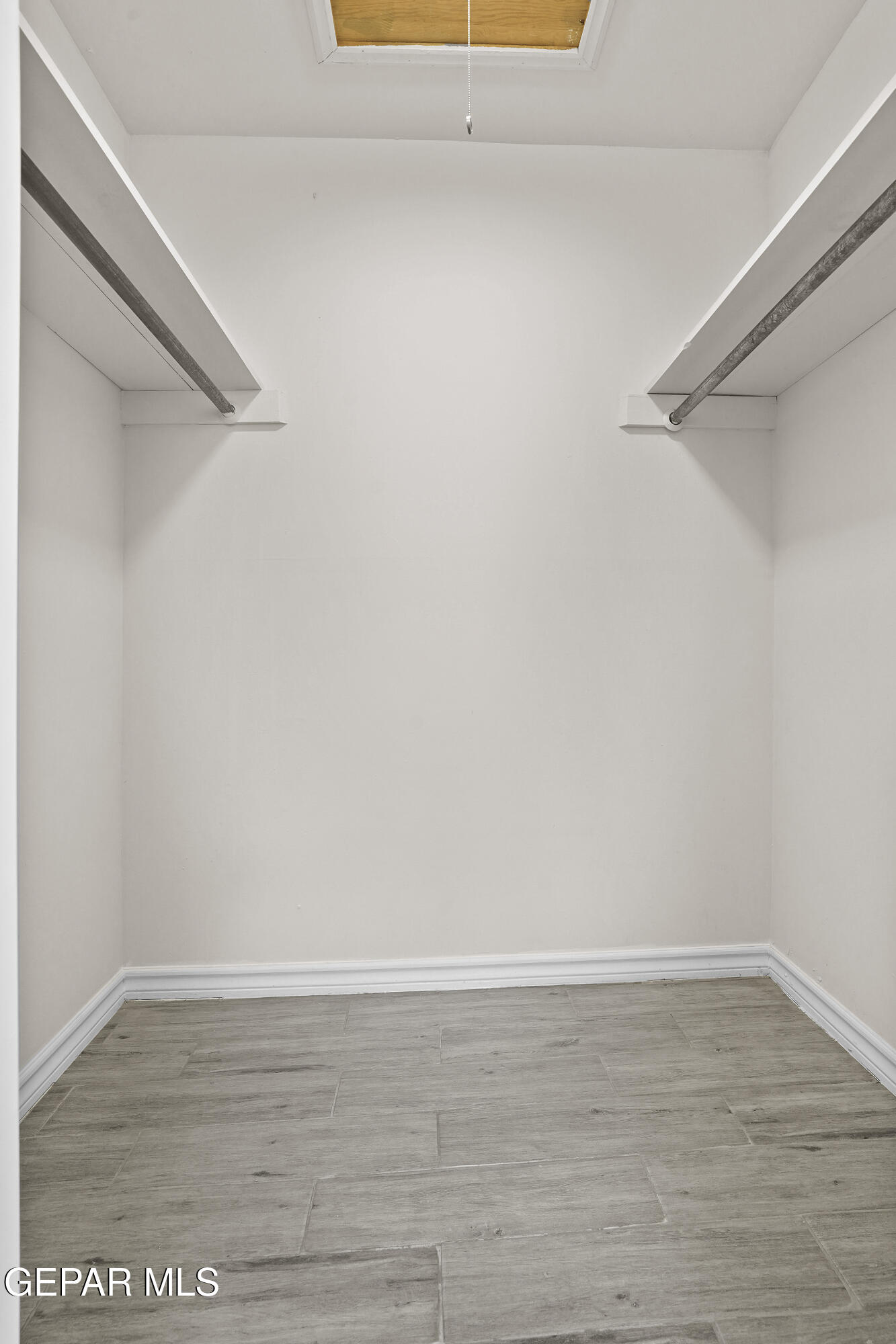 7809 Hemlock Street El Paso, TX 79925 - Photo 26 of 32 a view of an empty walk in closet