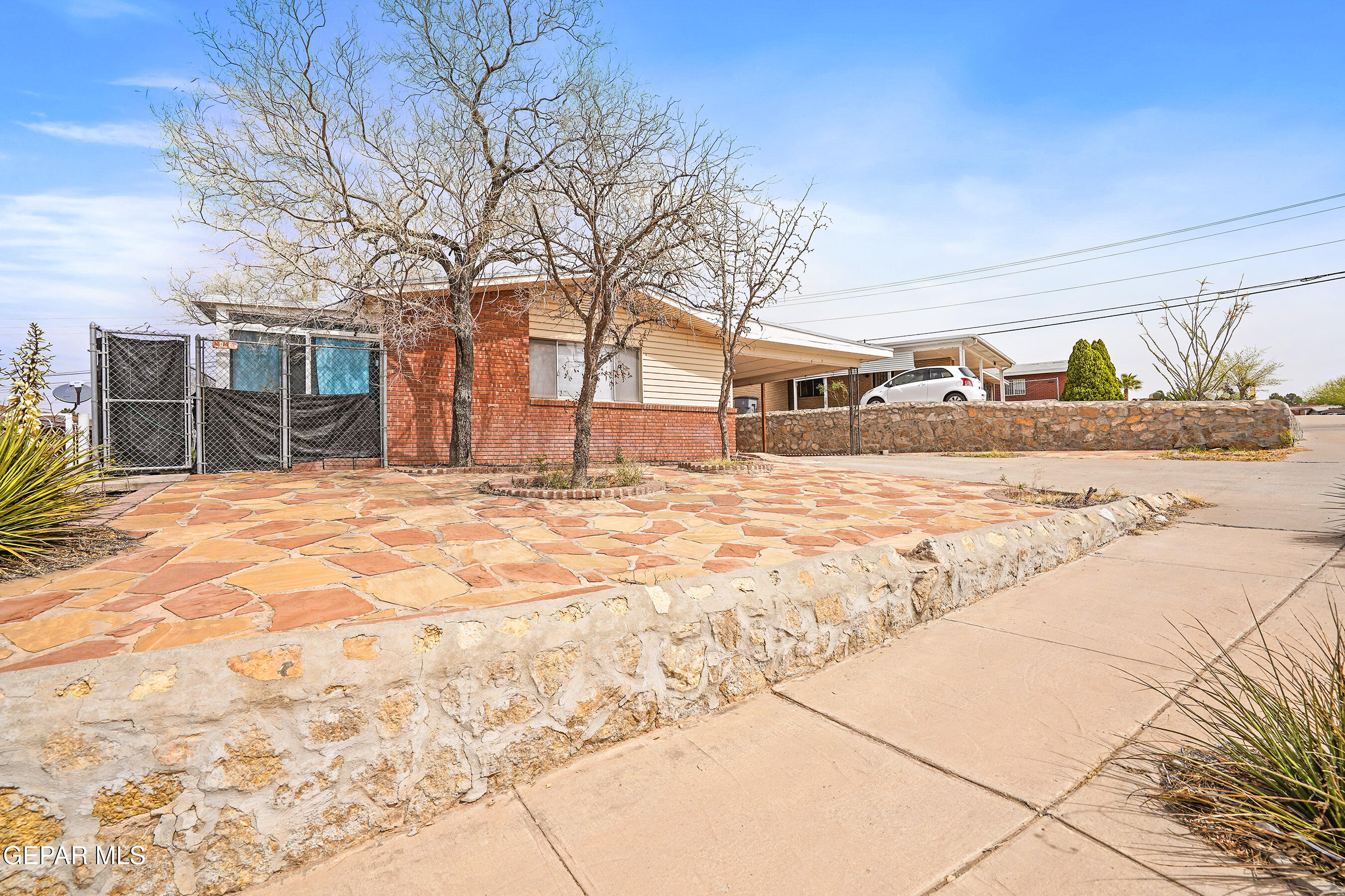 7809 Hemlock Street El Paso, TX 79925 - Photo 3 of 32 a view of large yard with a house