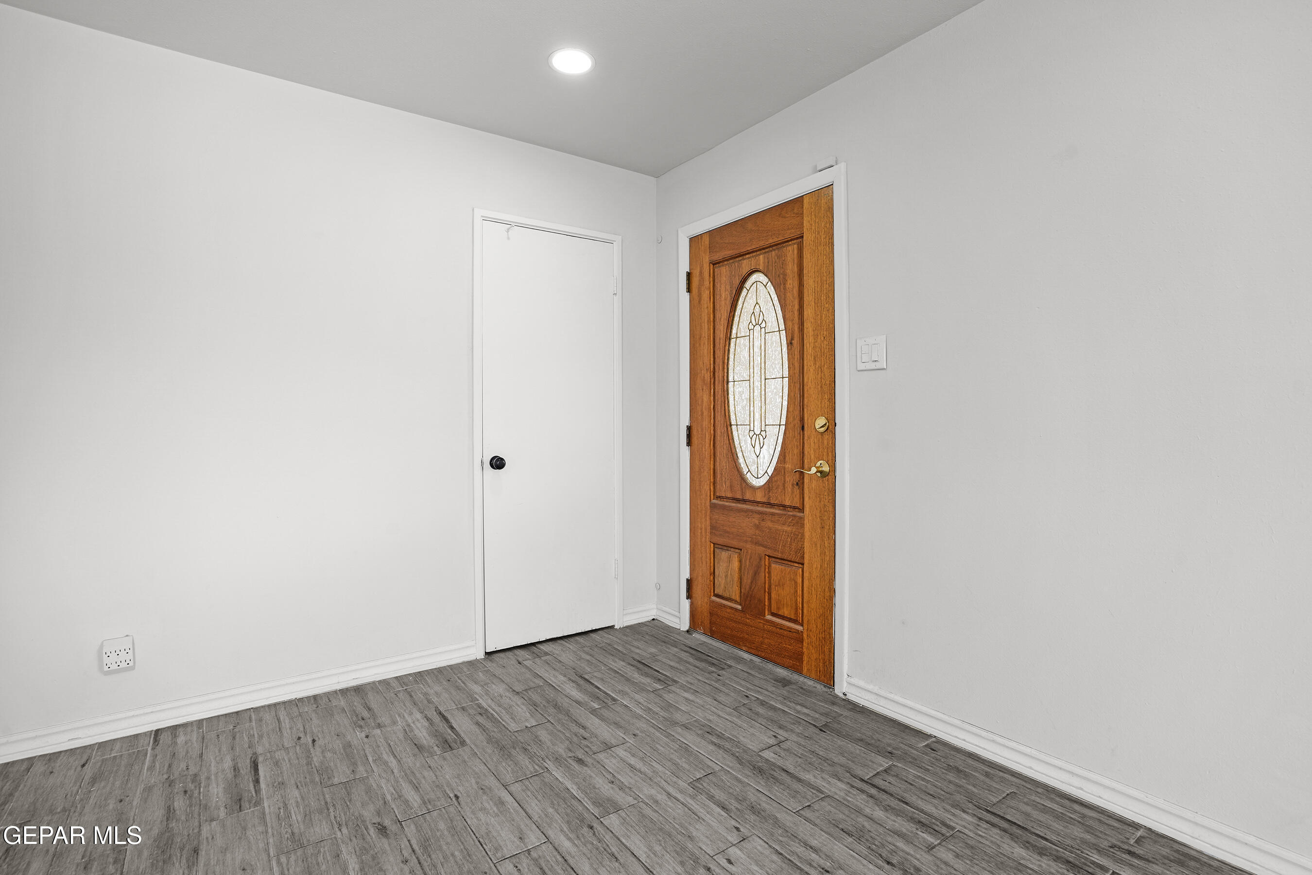 7809 Hemlock Street El Paso, TX 79925 - Photo 5 of 32 a view of empty room with wooden floor