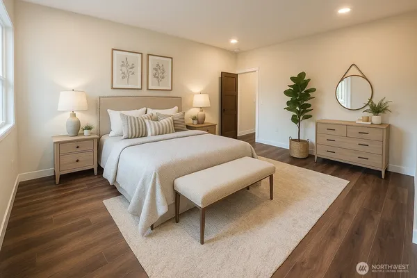 a bedroom with a bed and a dresser