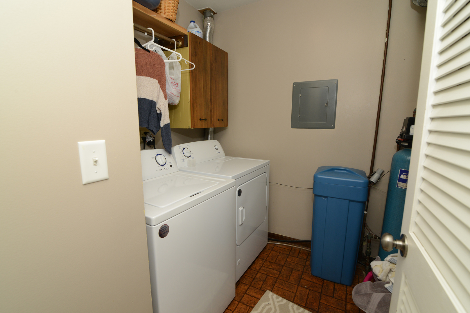 116 Dunham Place Commons, Unit 116 St. Charles, IL 60174 - Photo 19 of 26 a utility room with dryer and washer