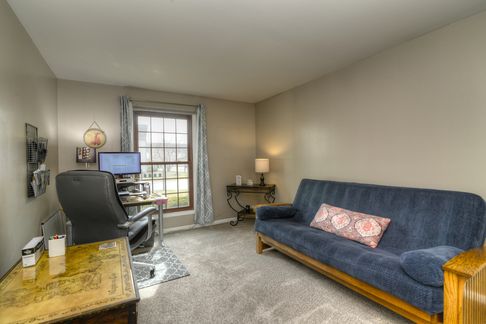 116 Dunham Place Commons, Unit 116 St. Charles, IL 60174 - Photo 20 of 26 a living room with furniture and a window