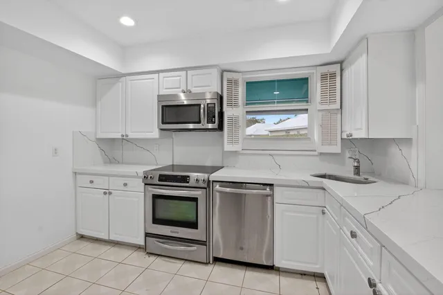 a view of a garden with an outdoor space