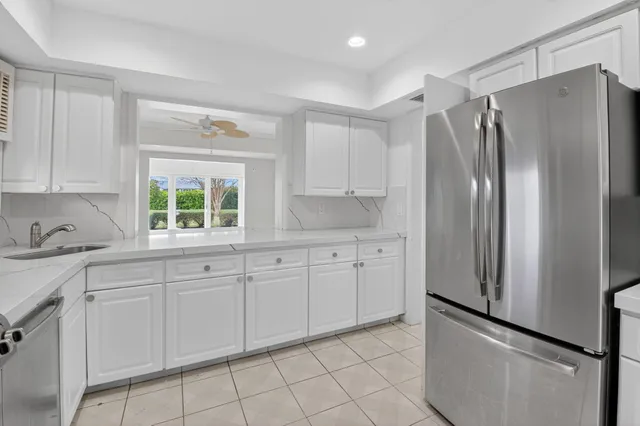 a view of a garden with a house