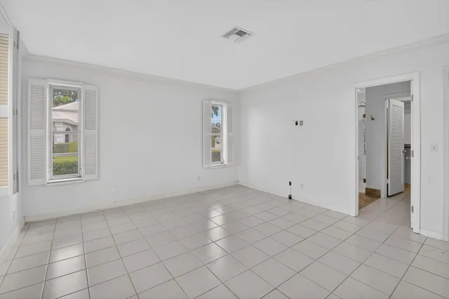 an aerial view of a house with a garden