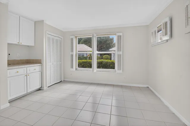an aerial view of residential houses with outdoor space and street view