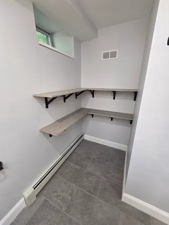 a view of an empty walk in closet