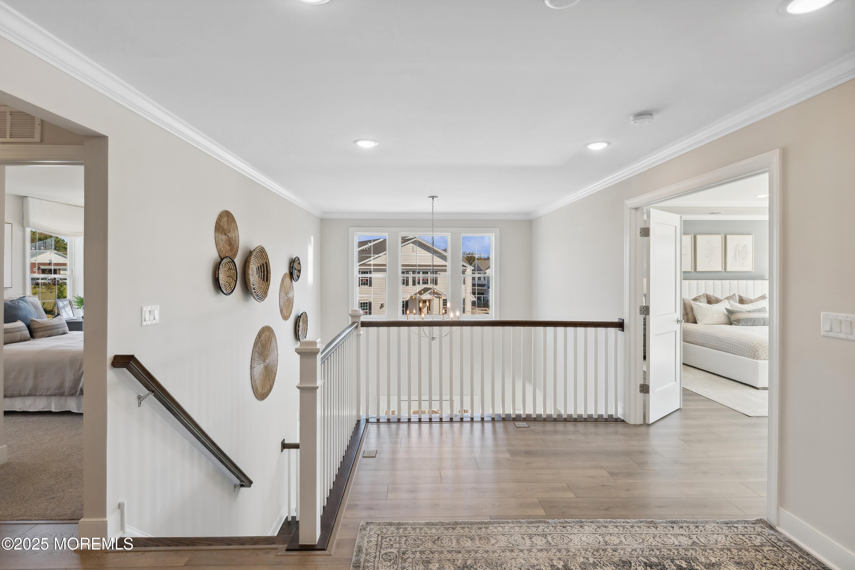 4061 Heron Drive Farmingdale, NJ 07727 - Photo 19 of 36 a view of a hallway with interior of the house