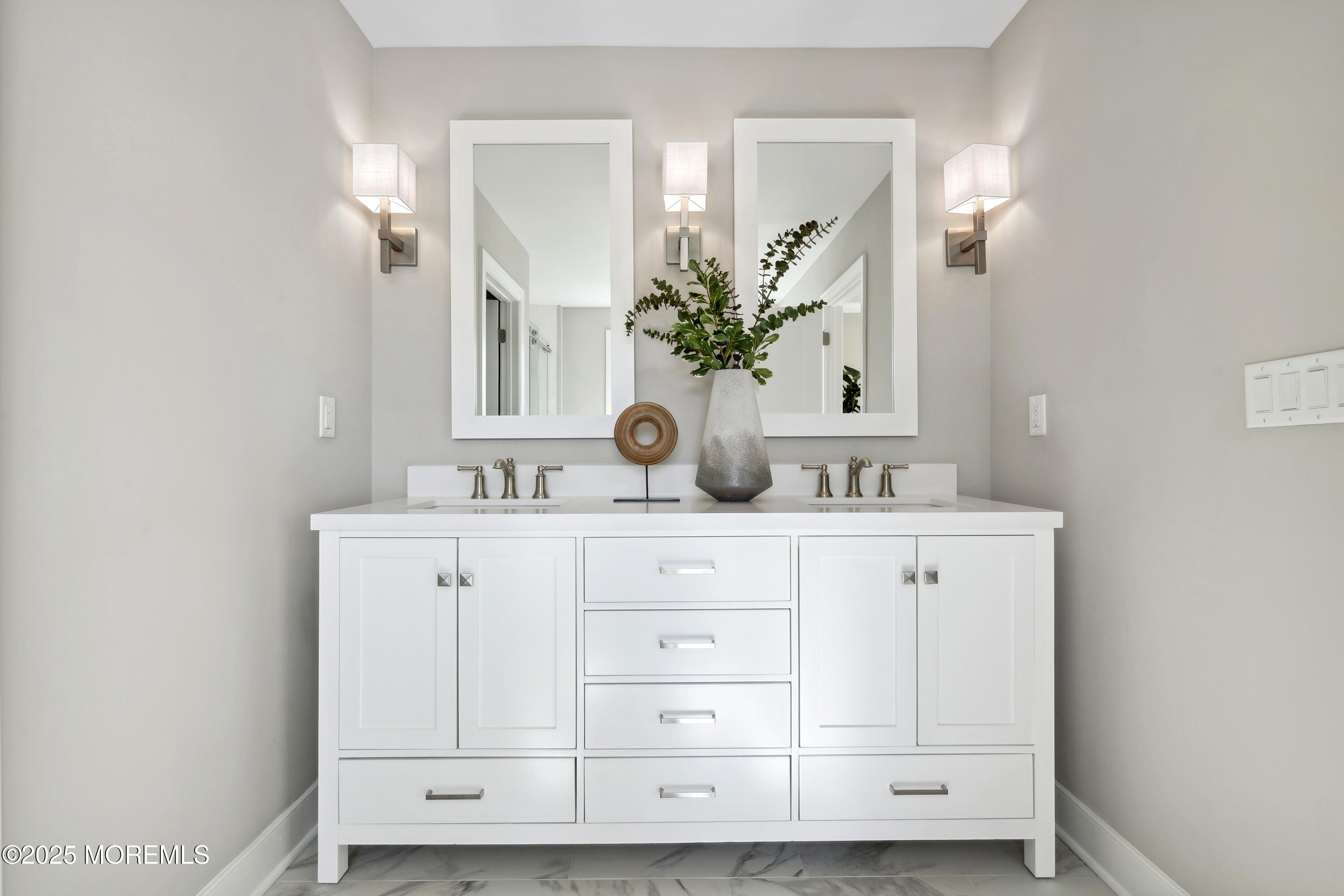 4061 Heron Drive Farmingdale, NJ 07727 - Photo 24 of 36 a bathroom with a sink and a mirror