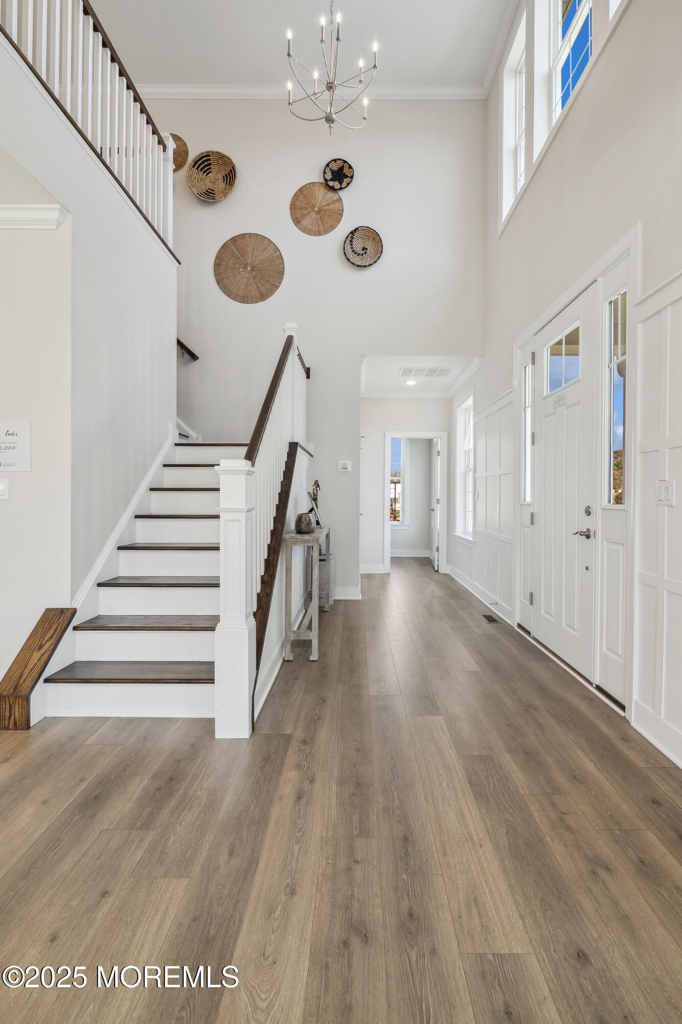 4061 Heron Drive Farmingdale, NJ 07727 - Photo 3 of 36 a view of entryway and hall with wooden floor