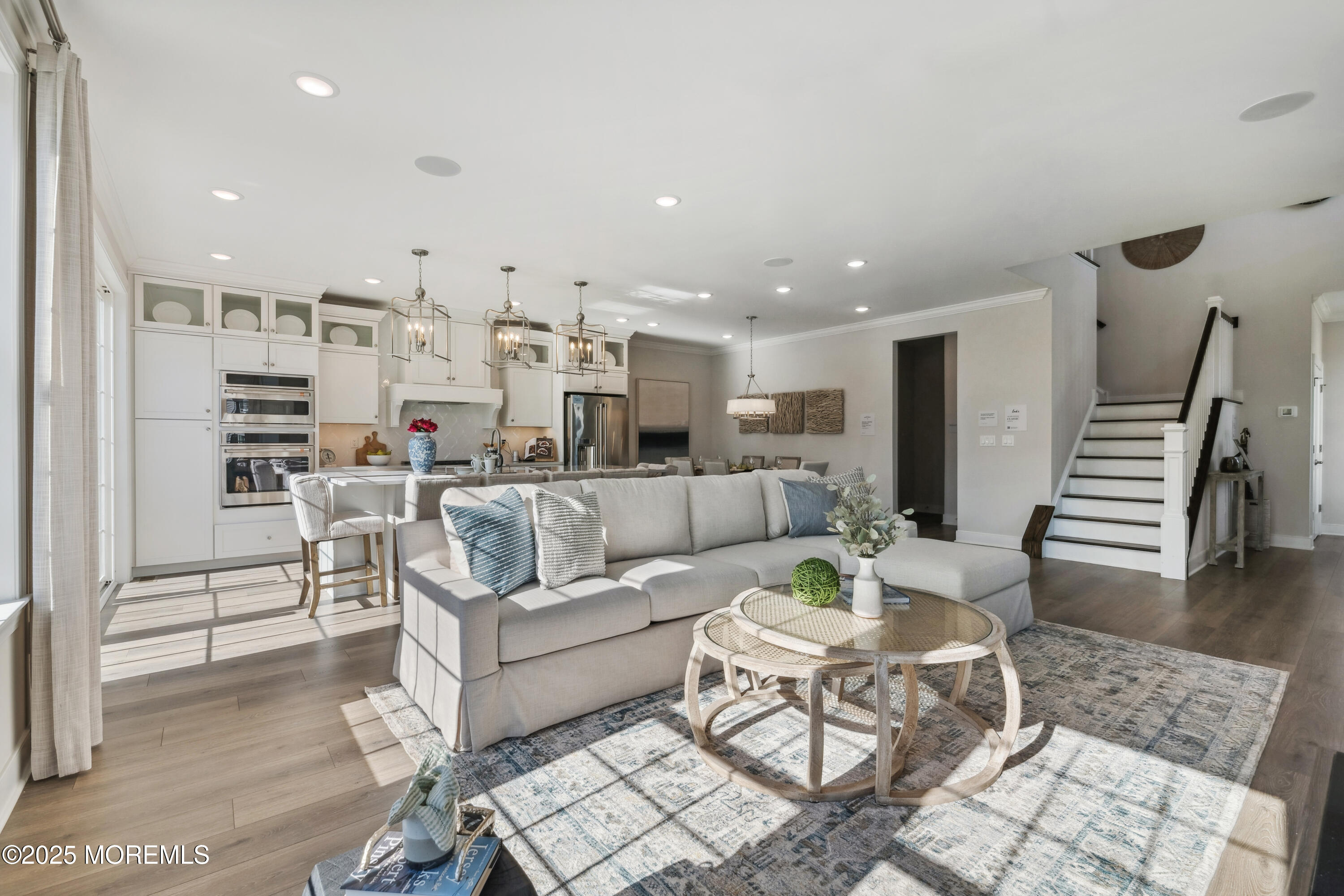 4061 Heron Drive Farmingdale, NJ 07727 - Photo 8 of 36 a living room with furniture kitchen view and a table