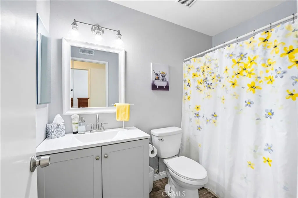 21902 Raintree Lane Lake Forest, CA 92630 - Photo 17 of 46 a bathroom with a sink toilet and shower