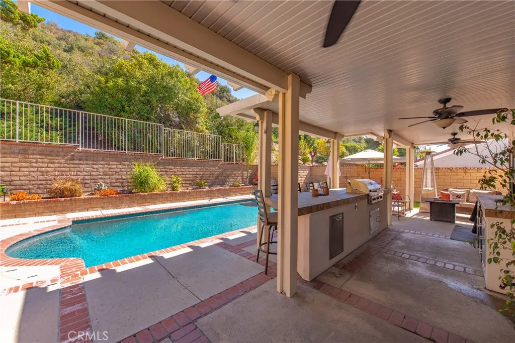 21902 Raintree Lane Lake Forest, CA 92630 - Photo 24 of 46 a view of a porch with a yard