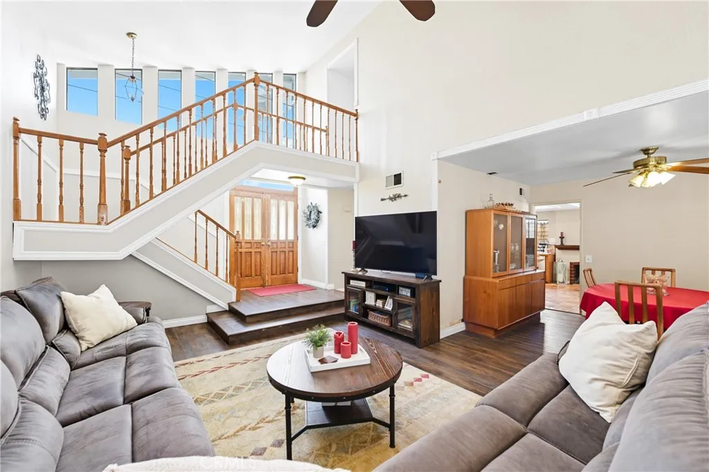 21902 Raintree Lane Lake Forest, CA 92630 - Photo 6 of 46 a living room with furniture and a flat screen tv
