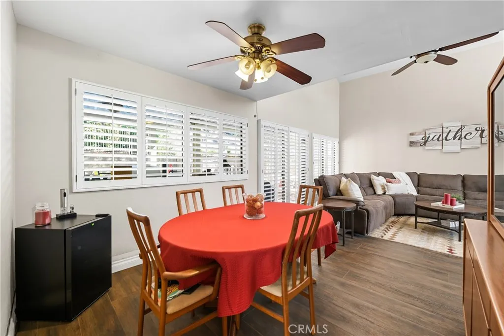 21902 Raintree Lane Lake Forest, CA 92630 - Photo 7 of 46 a view of a dining room with furniture and wooden floor
