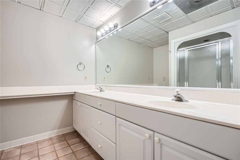 3330 Valley Vista Road Southeast Smyrna, GA 30080 - Photo 31 of 40 a bathroom with a sink and a mirror