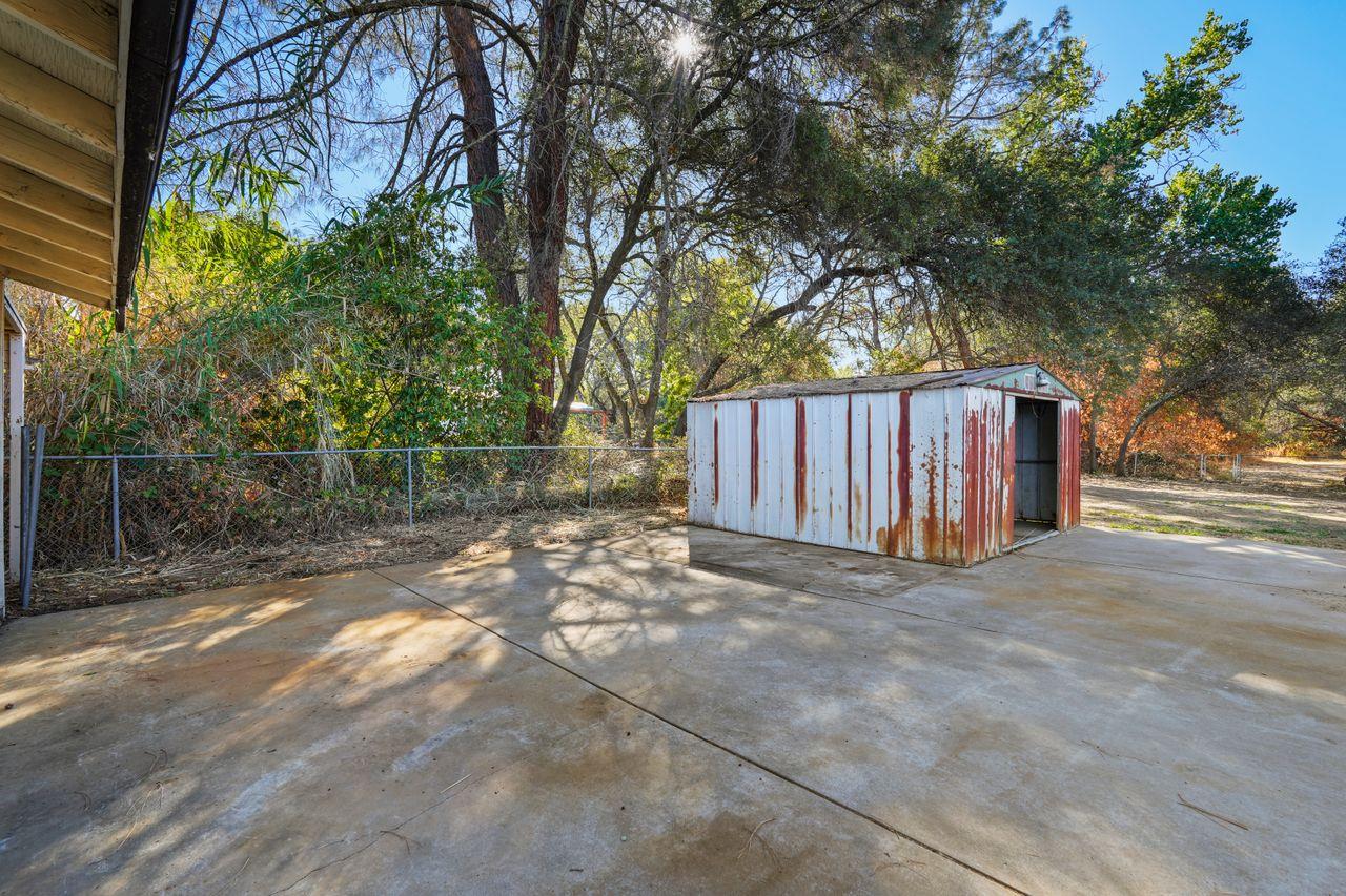 3331 Taylor Road Loomis, CA 95650 - Photo 38 of 97 a view of backyard with wooden fence and large trees