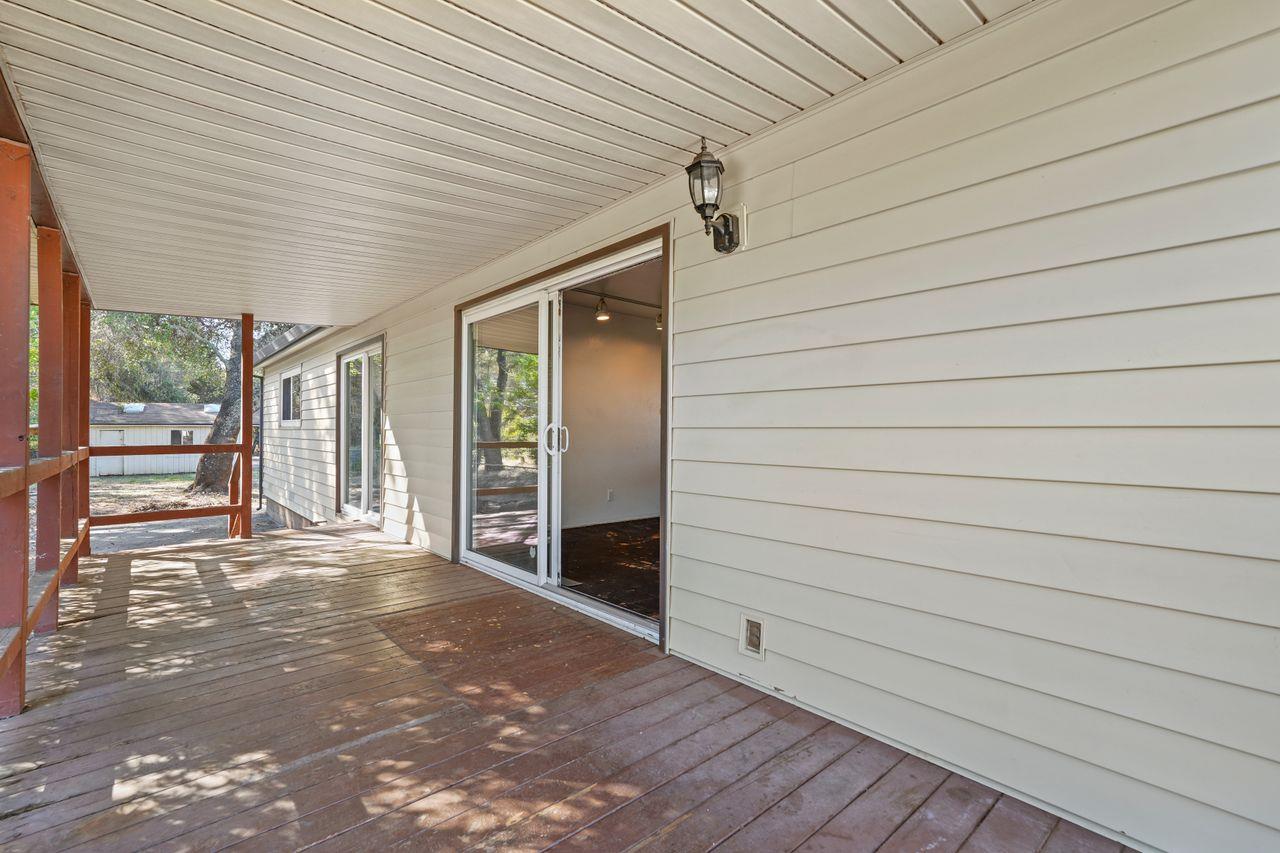 3331 Taylor Road Loomis, CA 95650 - Photo 4 of 97 a view of empty room with wooden floor and fan