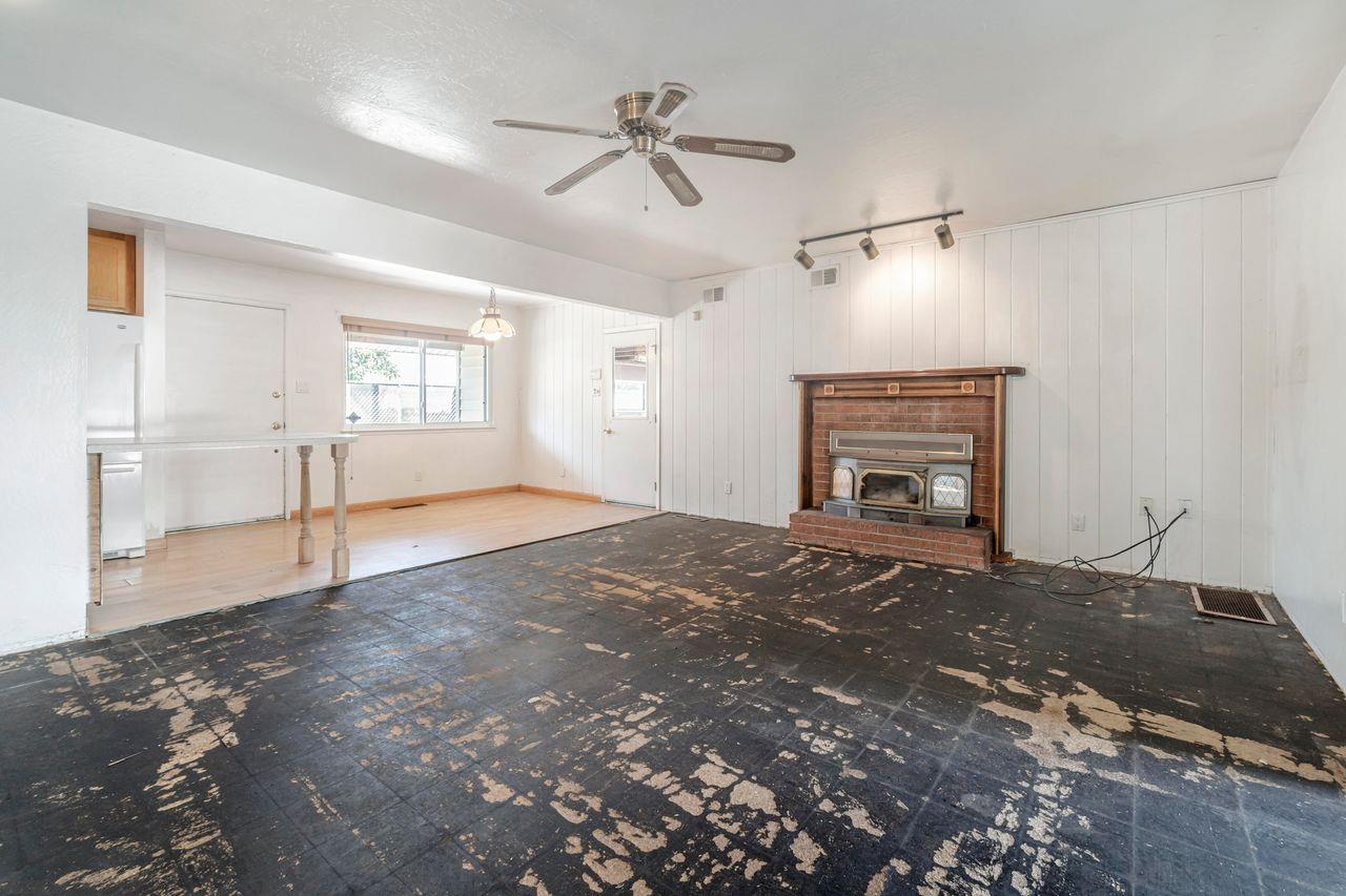 3331 Taylor Road Loomis, CA 95650 - Photo 56 of 97 a view of empty room with window and fireplace