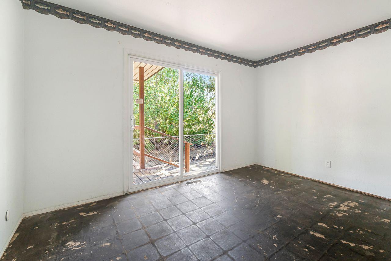 3331 Taylor Road Loomis, CA 95650 - Photo 66 of 97 a view of an empty room with wooden floor and a window