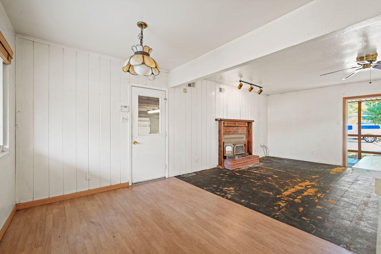 3331 Taylor Road Loomis, CA 95650 - Photo 82 of 97 a view of a livingroom with a chandelier fan and wooden floor