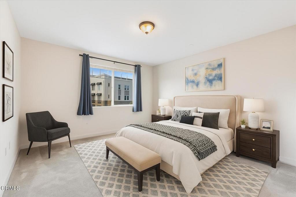 2830 Wagon Wheel Road, Unit 304 Oxnard, CA 93036 - Photo 15 of 45 a bedroom with a bed and a couch