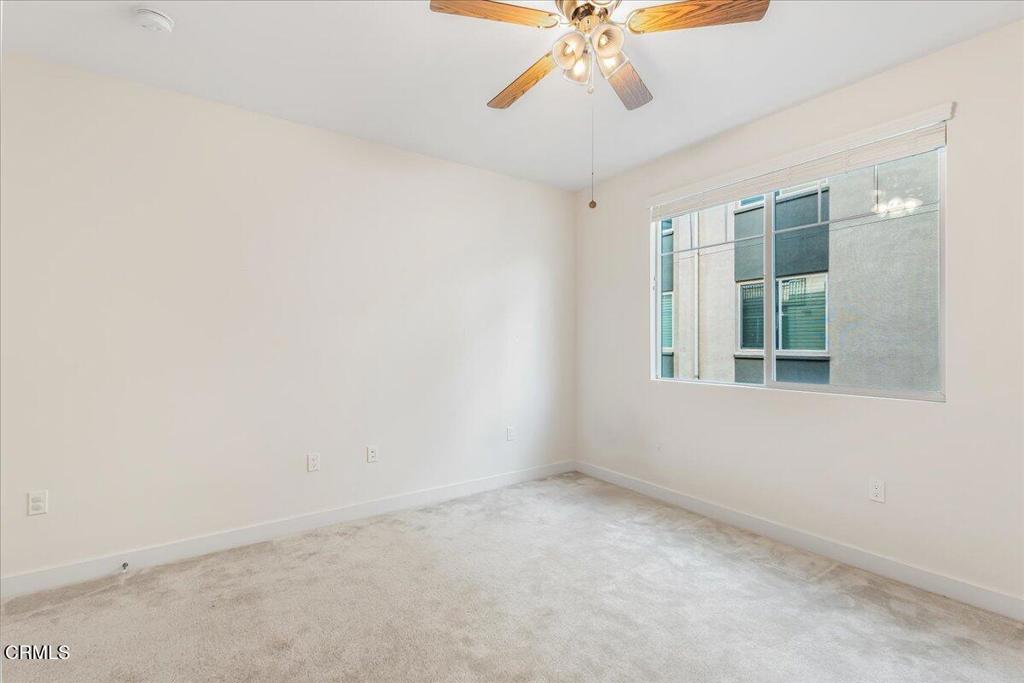 2830 Wagon Wheel Road, Unit 304 Oxnard, CA 93036 - Photo 19 of 45 an empty room with a window