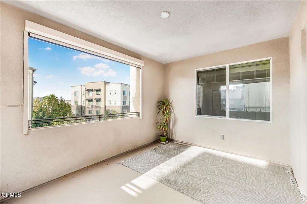 2830 Wagon Wheel Road, Unit 304 Oxnard, CA 93036 - Photo 21 of 45 a view of an empty room with a window