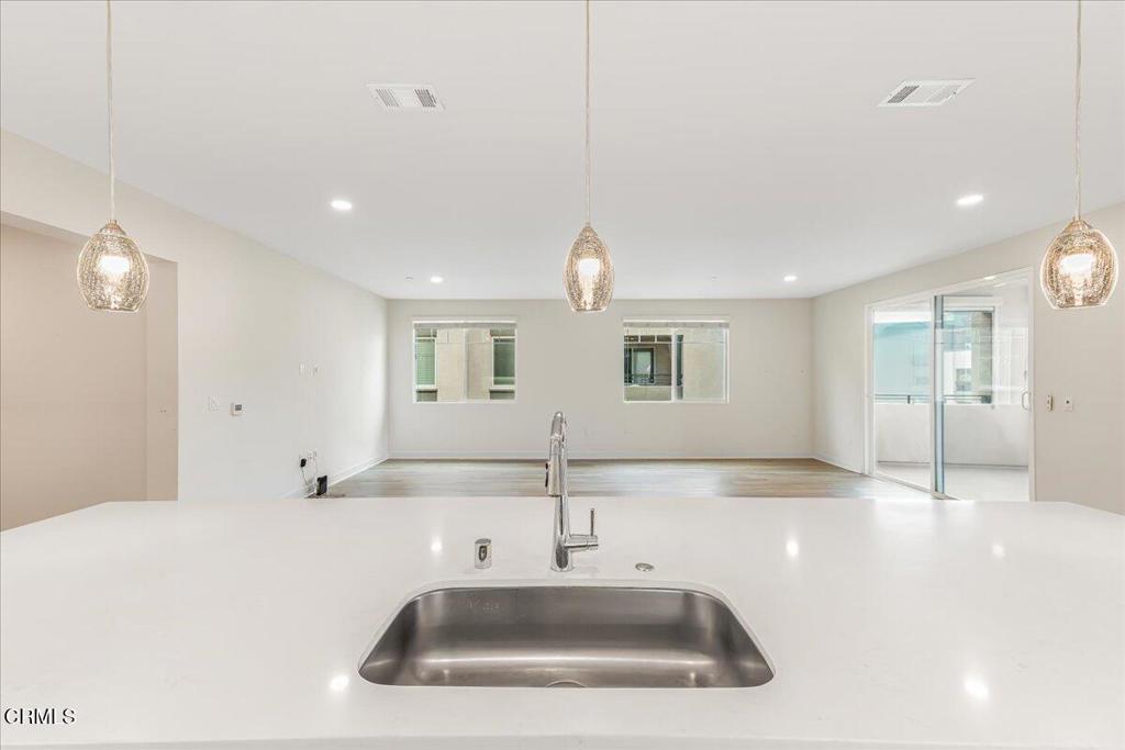 2830 Wagon Wheel Road, Unit 304 Oxnard, CA 93036 - Photo 6 of 45 a bathroom with a sink and a mirror
