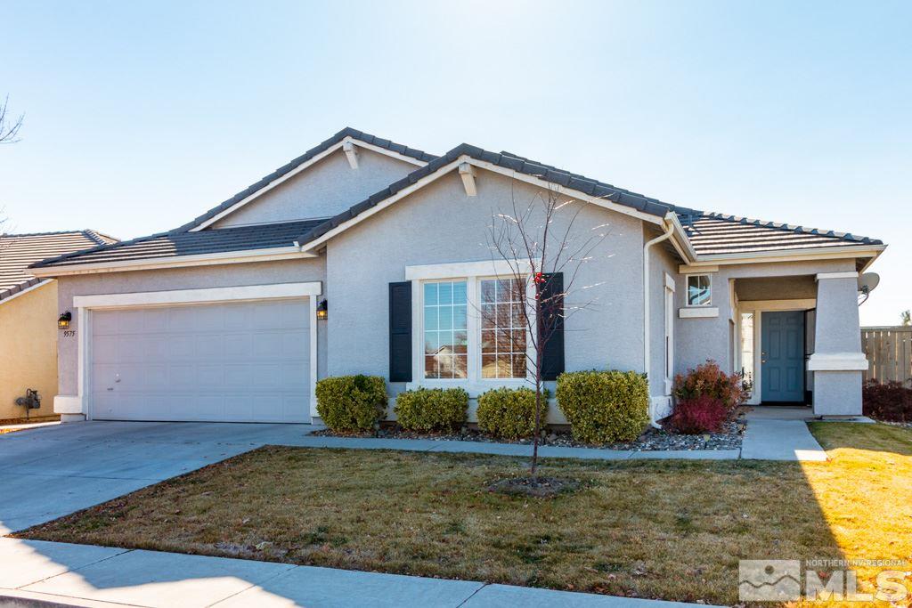 9575 Navigator Drive Reno, NV 89521 - Photo 1 of 13 a view of a house with potted plants