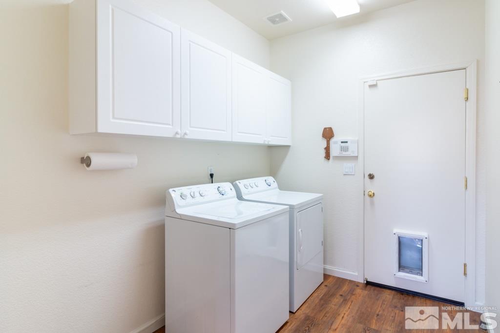 9575 Navigator Drive Reno, NV 89521 - Photo 11 of 13 a utility room with a sink washer and dryer