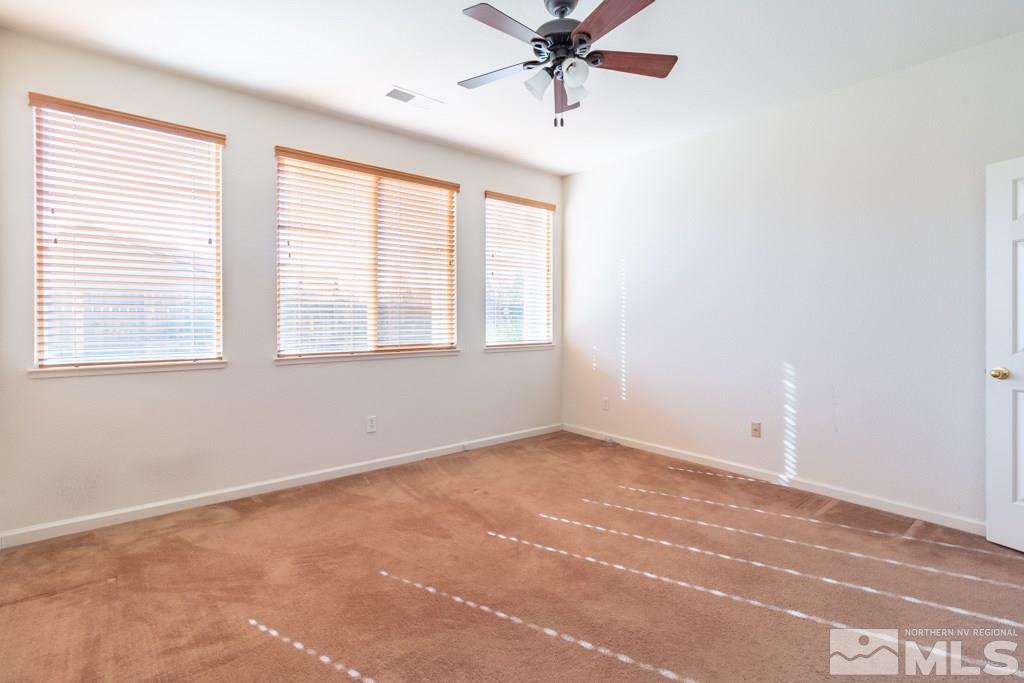 9575 Navigator Drive Reno, NV 89521 - Photo 9 of 13 an empty room with a window