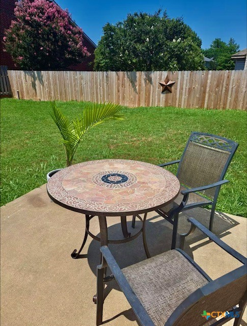 1054 Rolling Path New Braunfels, TX 78130 - Photo 13 of 14 a view of outdoor sitting area with chairs