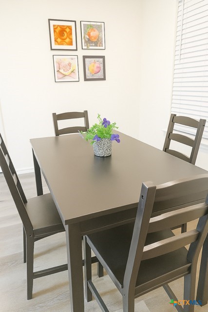 1054 Rolling Path New Braunfels, TX 78130 - Photo 7 of 14 a view of table and chair