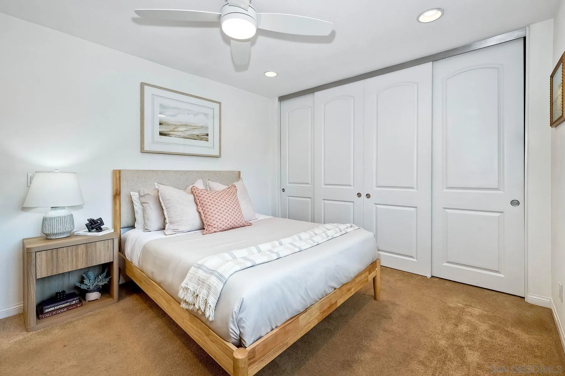 8850 Ellsworth Circle Santee, CA 92071 - Photo 15 of 29 a bedroom with a bed and lamp